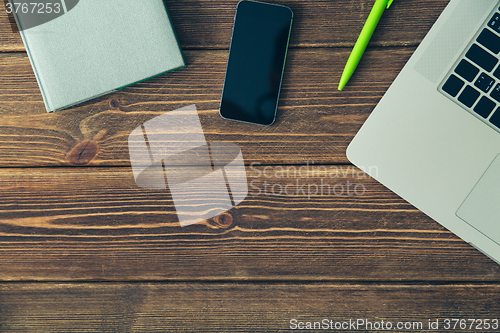 Image of Laptop and diary on the desk