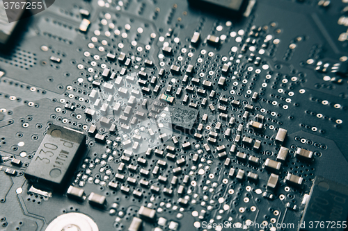 Image of Printed Circuit Board with electrical components.