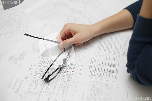 Image of Architect sketching a construction project