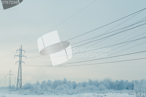 Image of Winter landscape with power line.