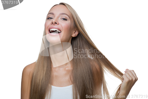 Image of Portrait of beautiful woman flowing hair 