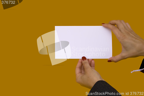 Image of Hands showing a blank card