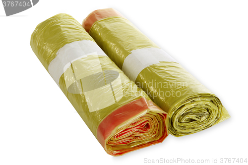 Image of Rolls of yellow trash bags 