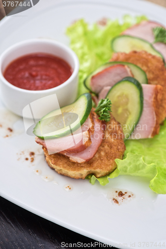 Image of pancakes with ham and cucumber 
