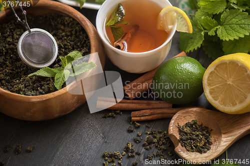 Image of berries  tea composition