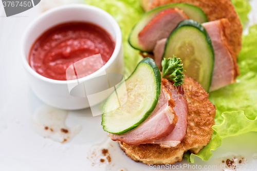 Image of pancakes with ham and cucumber 