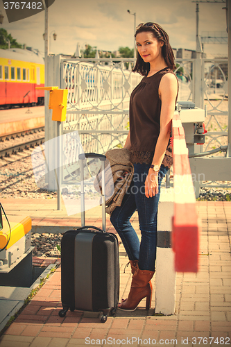 Image of travel portrait of a beautiful woman