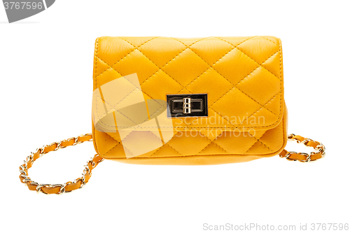 Image of Yellow womens bag isolated on white background.