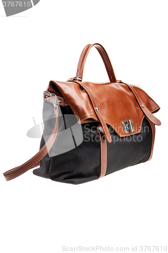 Image of Black and brown womens bag isolated on white background.