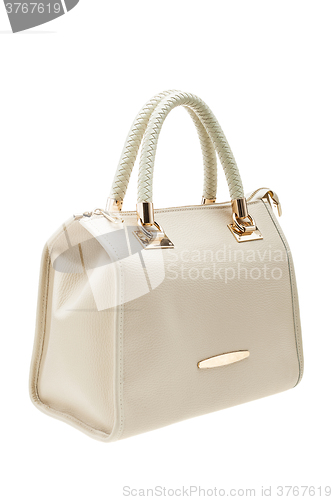 Image of Creme womens bag isolated on white background.