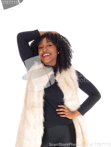 Image of African American woman in fur coat.