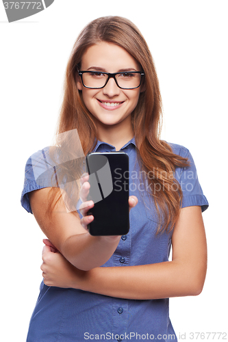 Image of Woman showing blank black smart phone screen