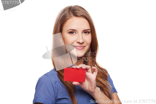 Image of Confident business woman in glasses showing blank credit card