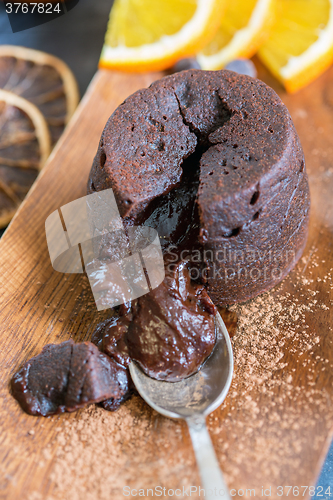 Image of Cupcake with melted chocolate filling.