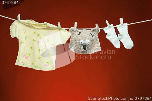 Image of Baby goods hanging on the clothesline