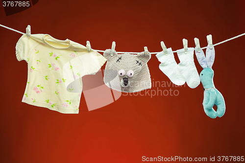 Image of Baby goods hanging on the clothesline