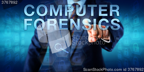 Image of Forensic Expert Pressing COMPUTER FORENSICS