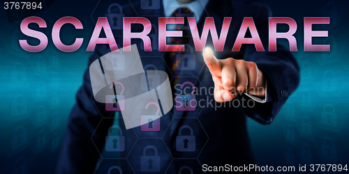 Image of Management User Touching SCAREWARE Onscreen