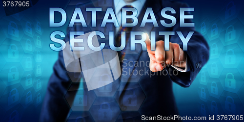 Image of Librarian Pushing DATABASE SECURITY Onscreen