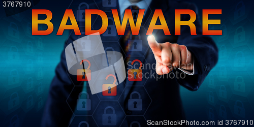 Image of Malware Author Pressing BADWARE Onscreen