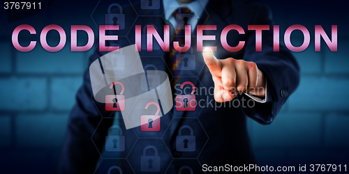 Image of Computer Administrator Pressing CODE INJECTION