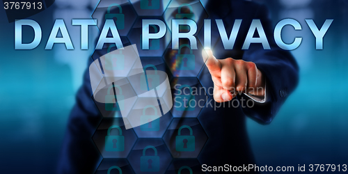 Image of Businessman Pressing DATA PRIVACY On A Screen