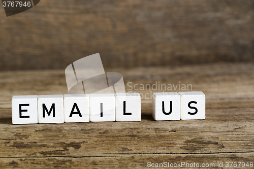 Image of The words email us written in cubes
