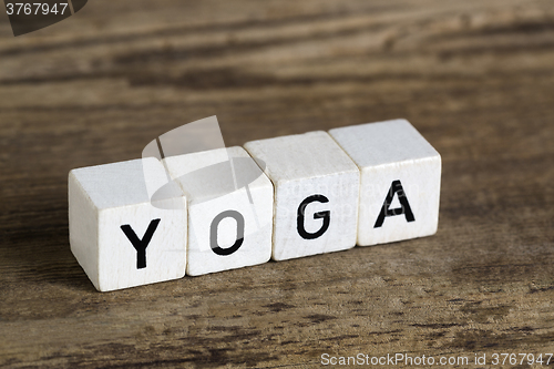 Image of The word yoga written in cubes