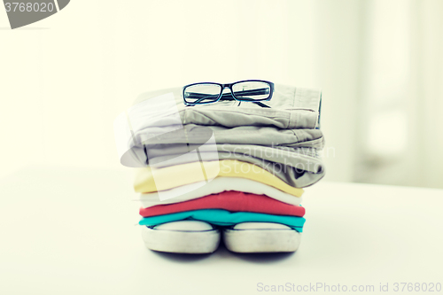 Image of close up of clothes and accessories on table