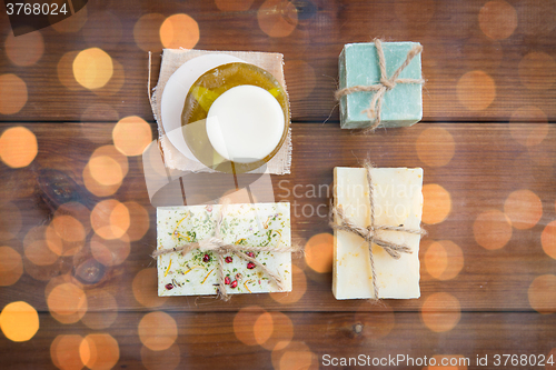 Image of close up of handmade soap bars on wood
