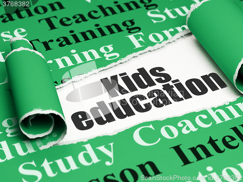 Image of Studying concept: black text Kids Education under the piece of  torn paper