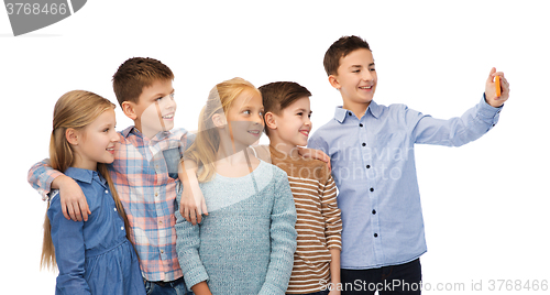 Image of happy children talking selfie by smartphone