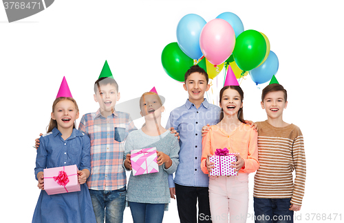 Image of happy children with gifts on birthday party