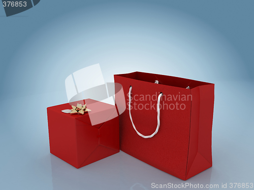 Image of Gift box with golden bow and gift bag