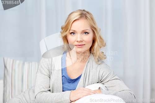 Image of middle aged woman at home