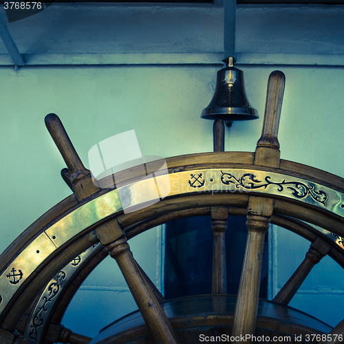 Image of Steering wheel of an old sailing vessel, close up