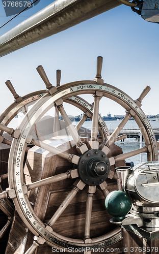 Image of Steering wheel of an old sailing vessel, close up