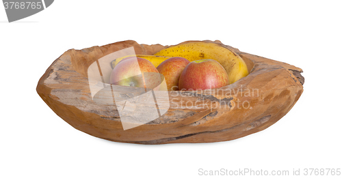 Image of Ripe fruit assortment in a wooden bowl isolated