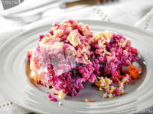 Image of homemade beet and boiled vegetable salad