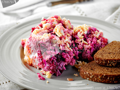 Image of homemade beet and boiled vegetable salad