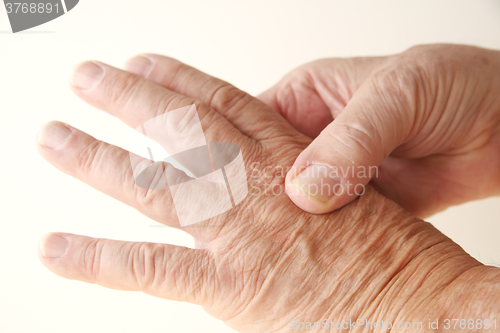 Image of Aching knuckle on older man