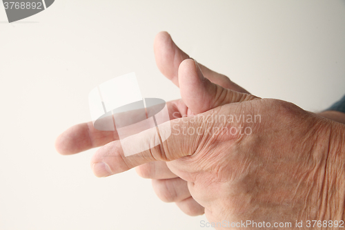 Image of Man using finger shooting gesture