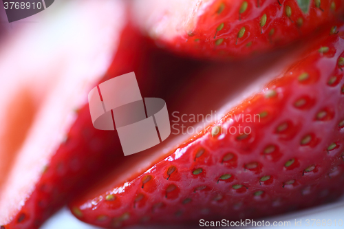 Image of Freshly sliced strawberries macro