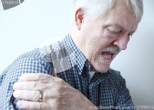 Image of Bad pain in shoulder of senior man
