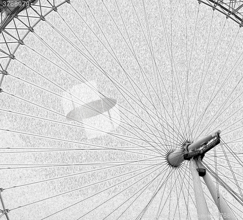 Image of london eye in the spring sky and white clouds