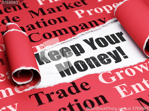 Image of Business concept: black text Keep Your Money! under the piece of  torn paper