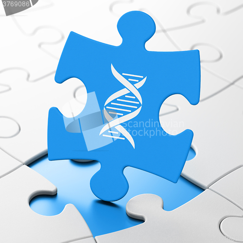 Image of Healthcare concept: DNA on puzzle background