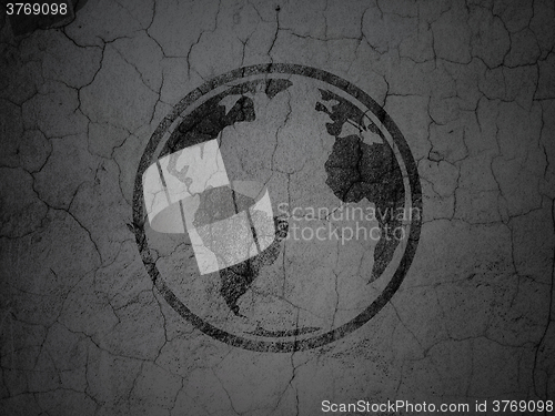 Image of Science concept: Globe on grunge wall background