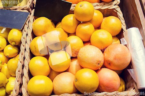 Image of ripe grapefruits at food market