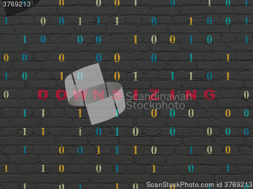 Image of Business concept: Downsizing on wall background
